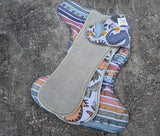 Burlap Rainbow Dinos | OneSize Hybrid Fitted | cloth diapers | Fitted diaper | bamboo stretch french terry